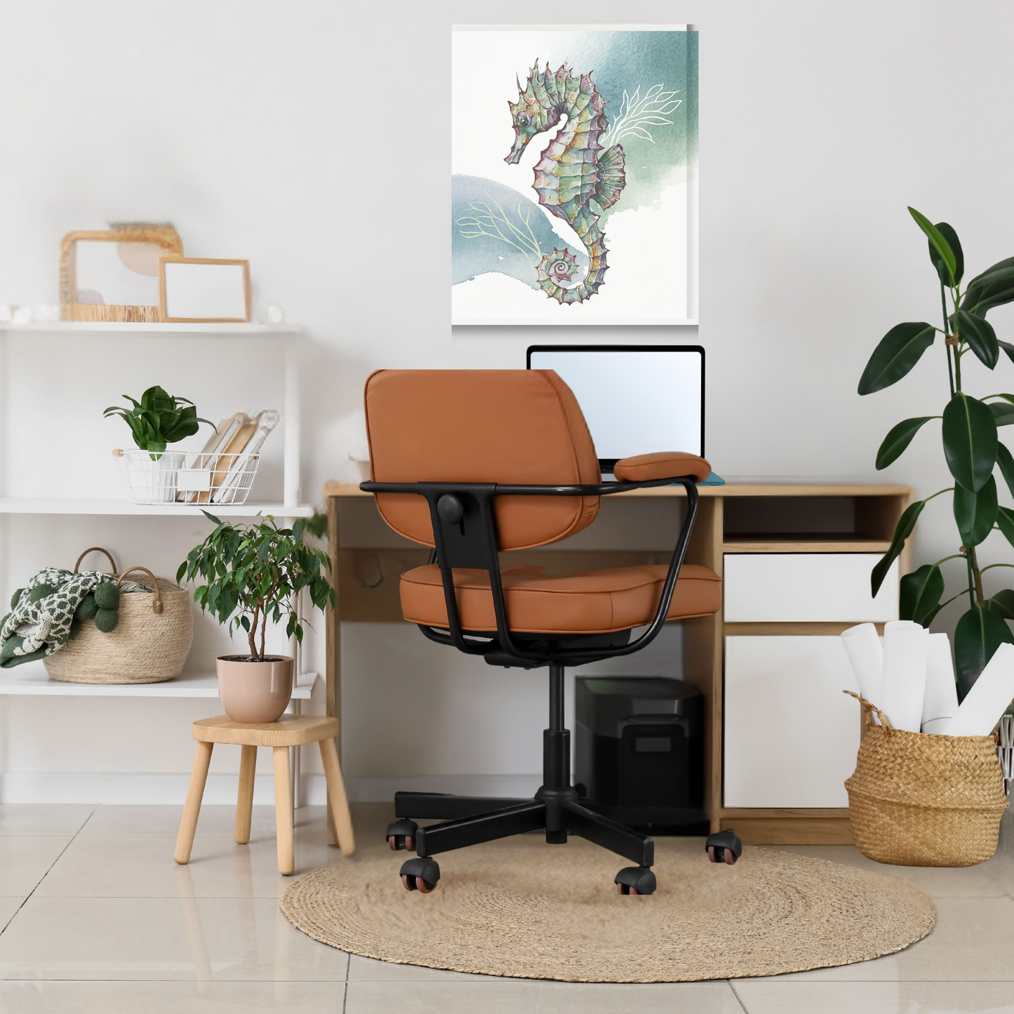 Home office with a desk, chair, and decorative elements. A large, vertical, unframed canvas print of a seahorse with gray and blue hued background hangs on the wall in front of the desk.